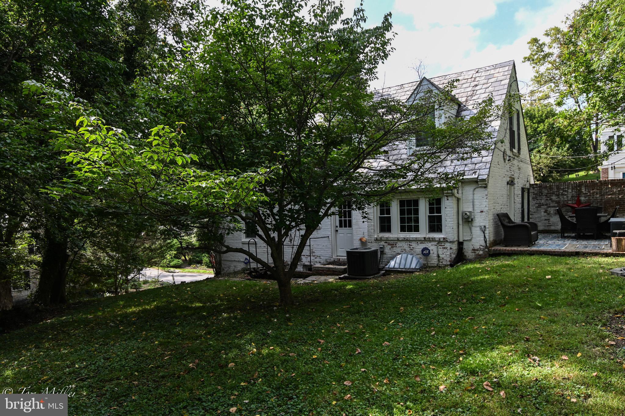 5815 Lochlea Road Baltimore, MD 21209 - Photo 37 of 40 a front view of a house with garden
