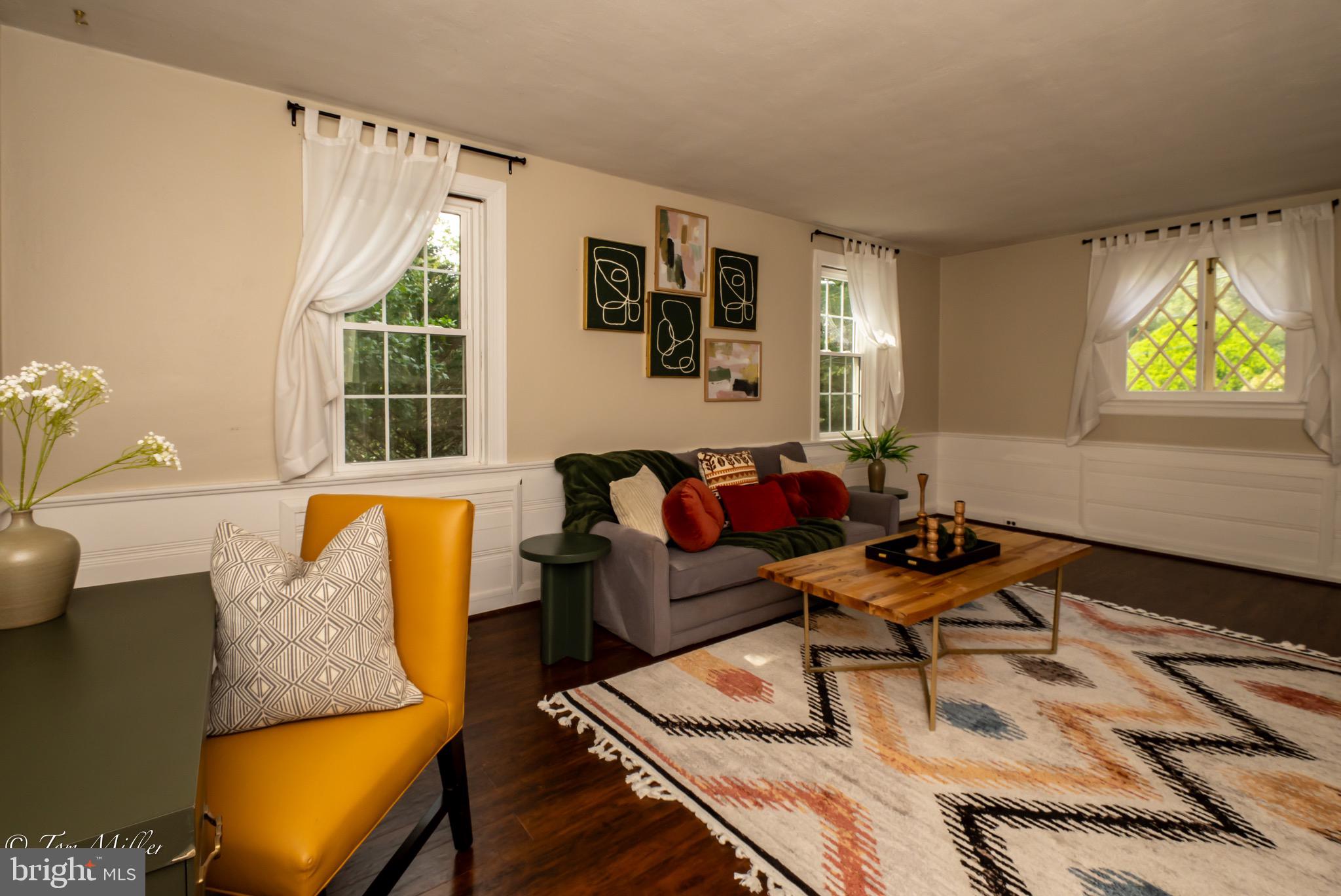 5815 Lochlea Road Baltimore, MD 21209 - Photo 5 of 40 a living room with furniture and a large window