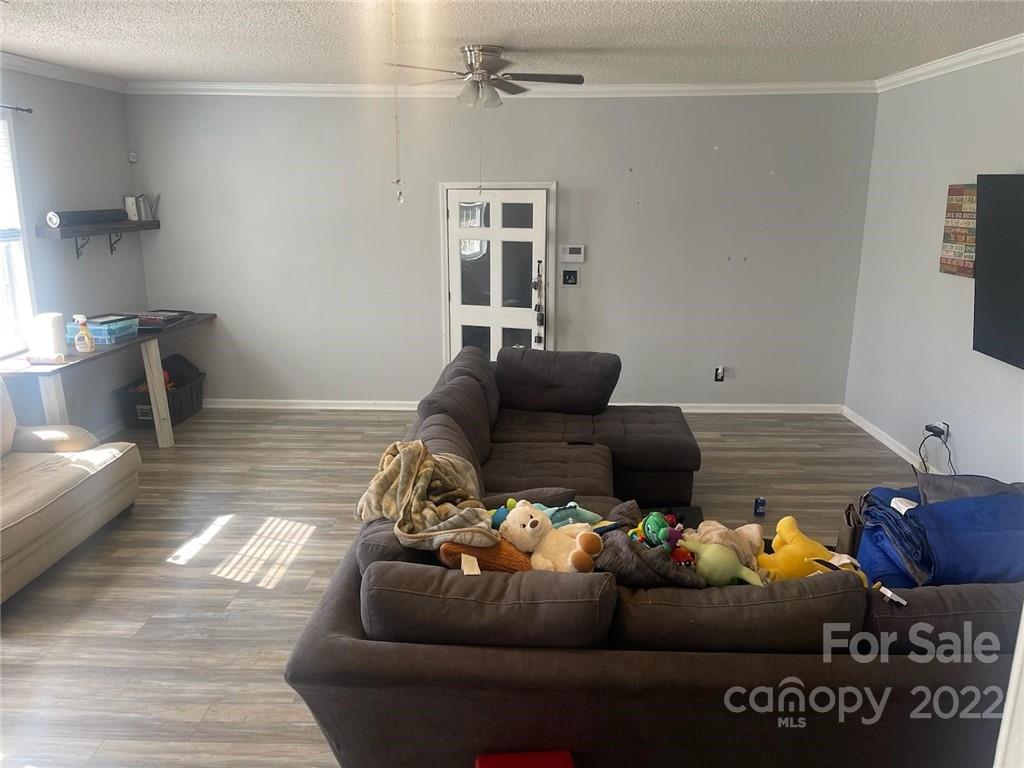4030 Robinson Road Newton, NC 28658 - Photo 3 of 9 a living room with furniture and a couch
