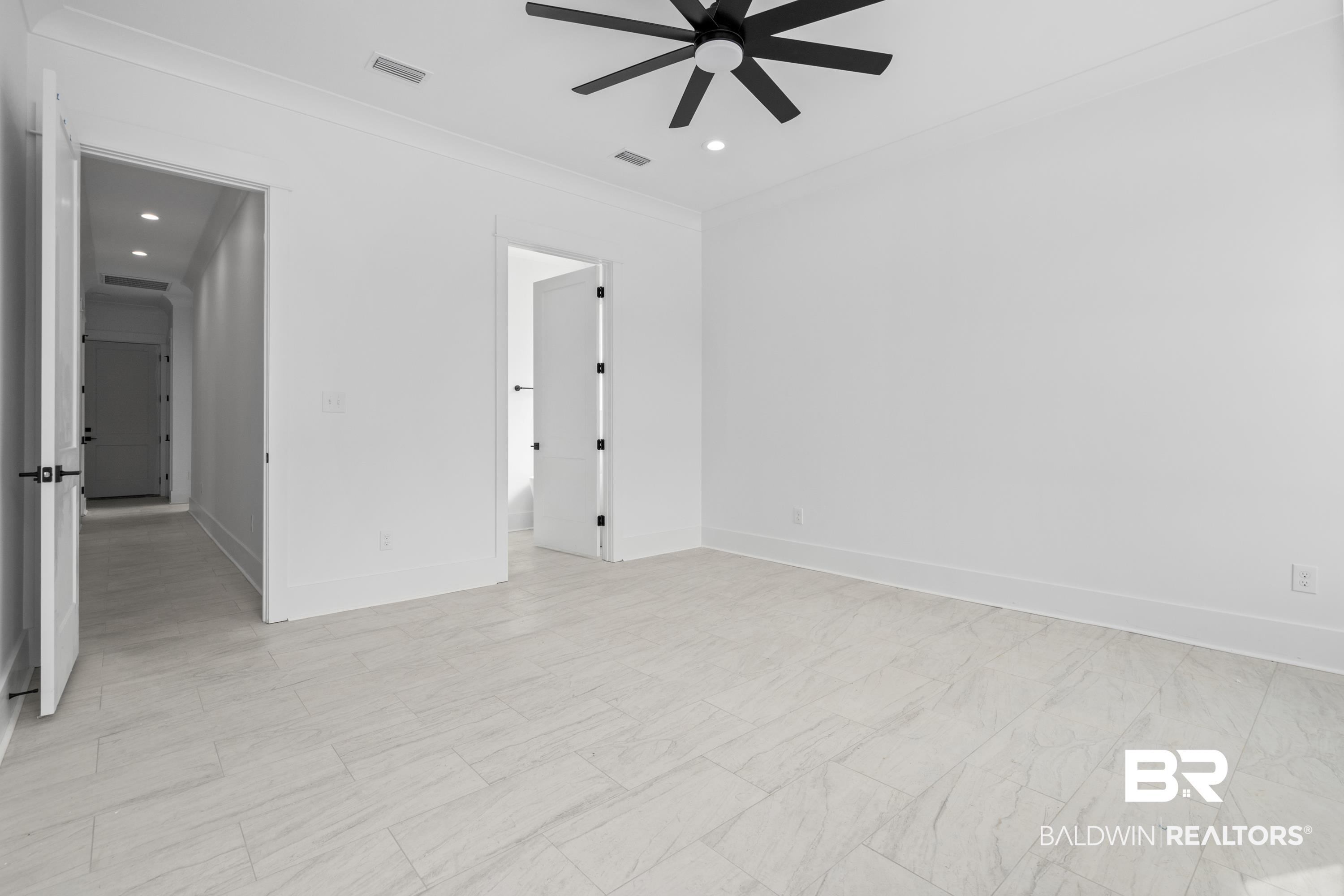 30650 Ono N Loop West Orange Beach, AL 36561 - Photo 15 of 38 Unfurnished room featuring ceiling fan, recessed lighting, baseboards, and crown molding