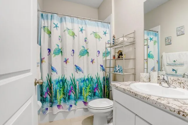 a view of room with workspace and windows