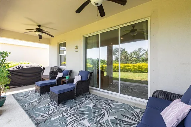 a view of a patio with garden
