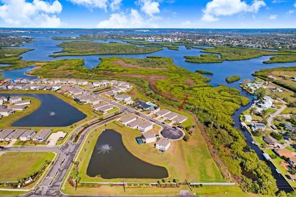 a view of a swimming pool with a patio
