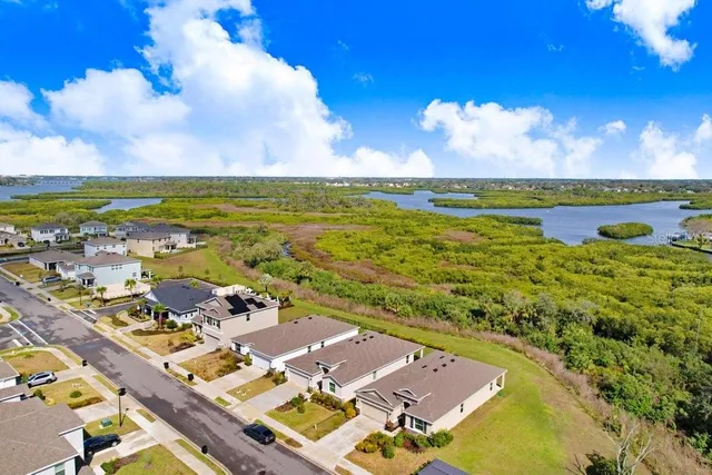 a view of a city with an ocean