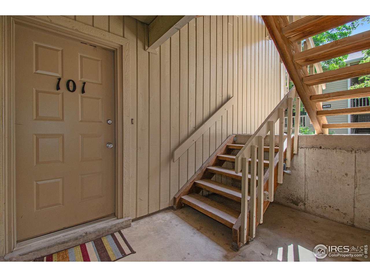 4068 South Atchison Way, Unit 101 Aurora, CO 80014 - Photo 11 of 12 a view of entryway with stairs
