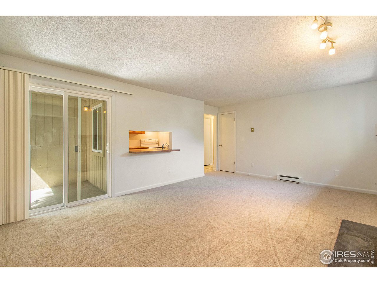 4068 South Atchison Way, Unit 101 Aurora, CO 80014 - Photo 4 of 12 a view of an empty room