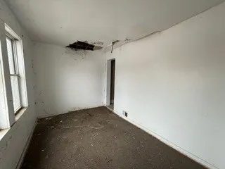 an empty room with a window