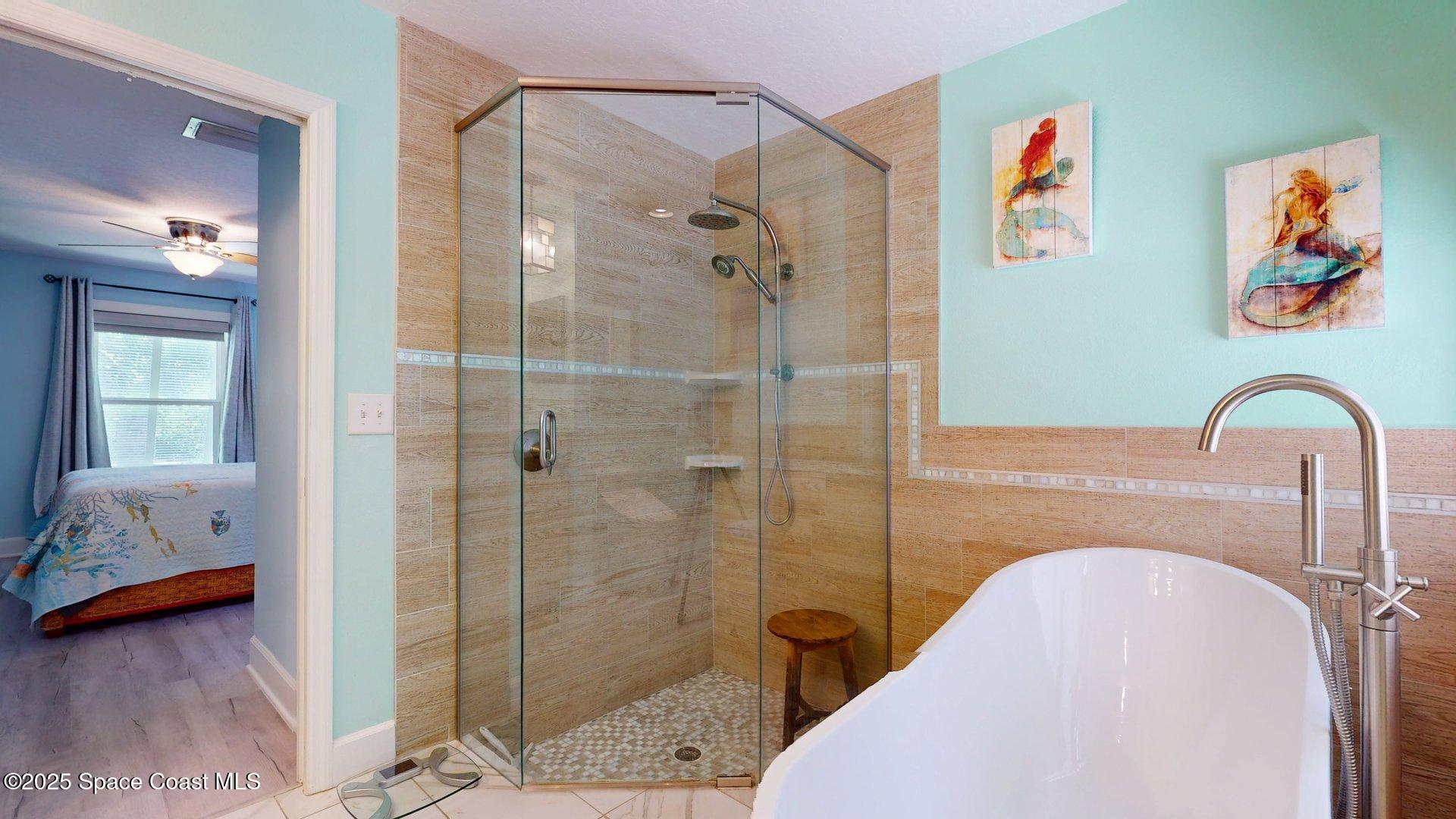 103 Matanzas Road Melbourne Beach, FL 32951 - Photo 20 of 37 a bathroom with a sink and a shower