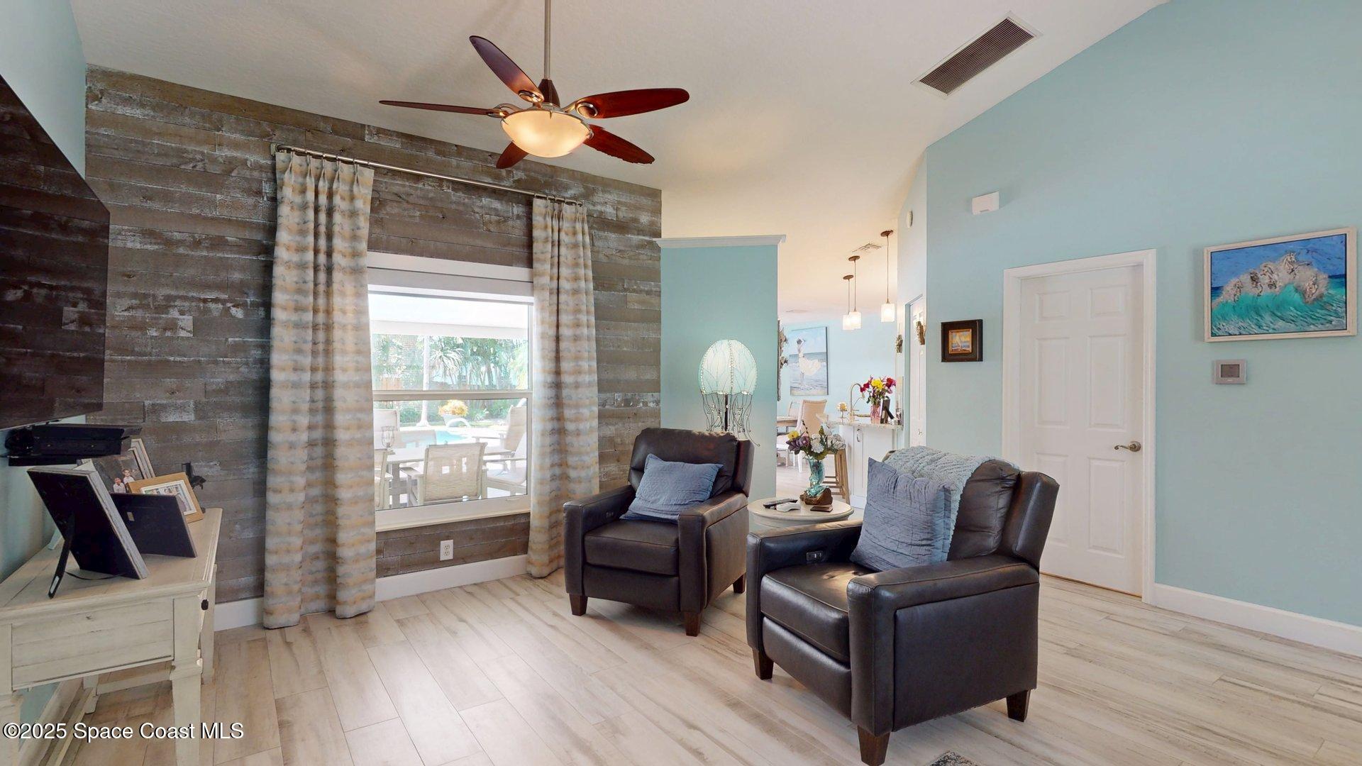 103 Matanzas Road Melbourne Beach, FL 32951 - Photo 28 of 37 a living room with furniture and a window