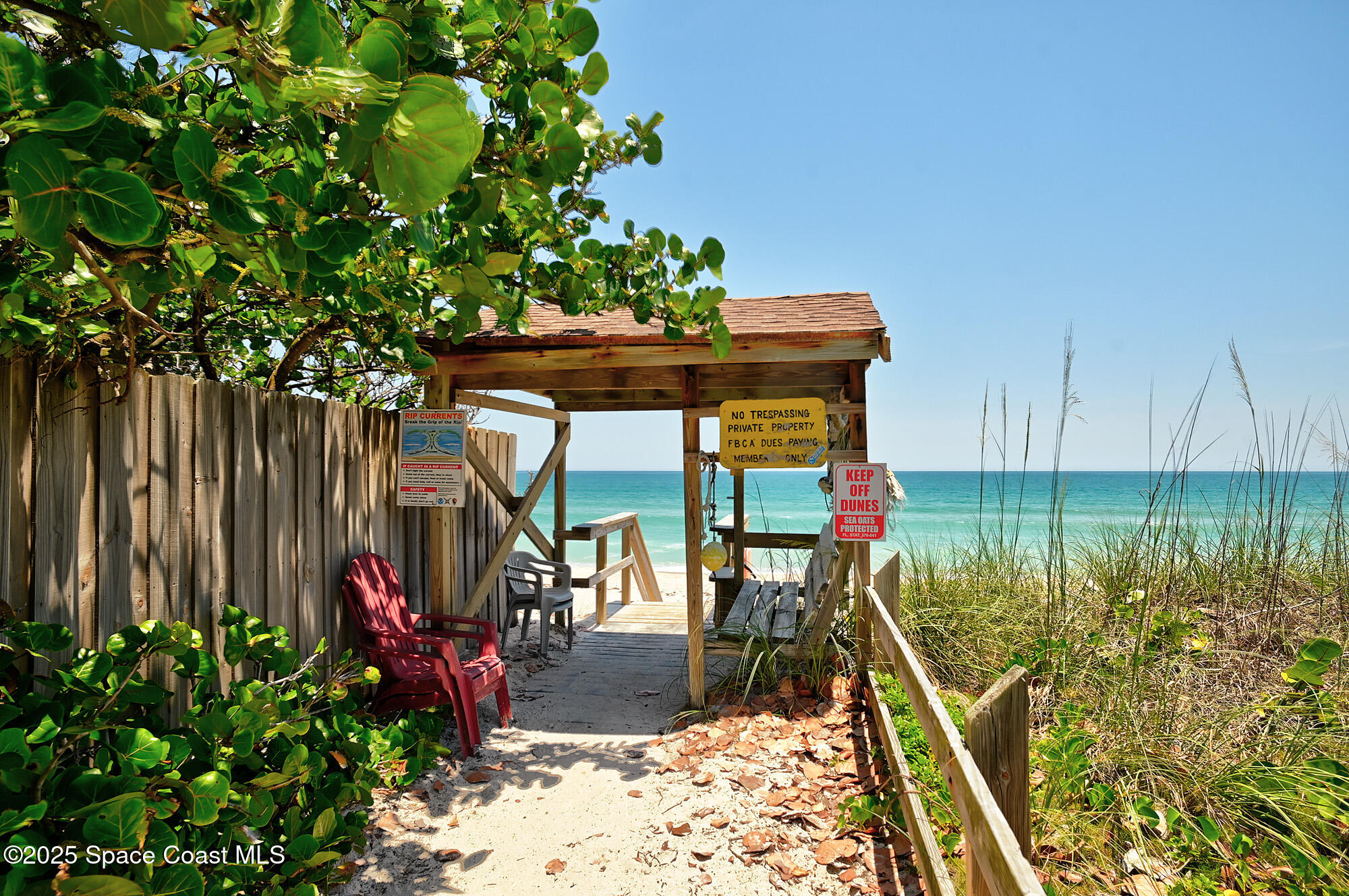 103 Matanzas Road Melbourne Beach, FL 32951 - Photo 36 of 37 a view of a chairs and table in the patio