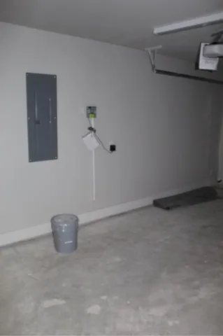 a white toilet and tub sitting next to a bathroom sink