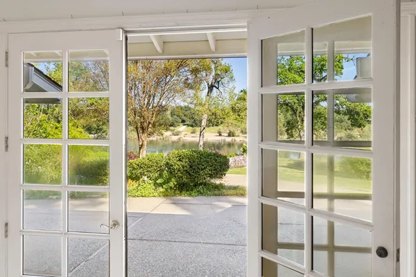 a kitchen with a sink stove and refrigerator