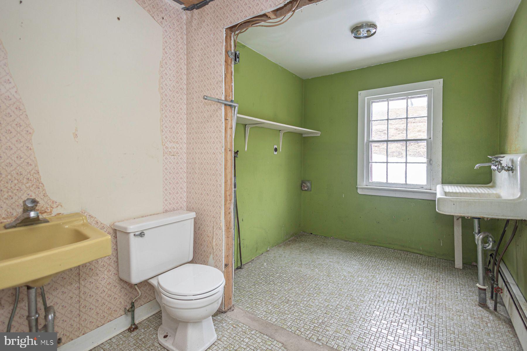 Lot 1 Curly Hill Road Doylestown, PA 18902 - Photo 31 of 40 a bathroom with toilet sink and green walls
