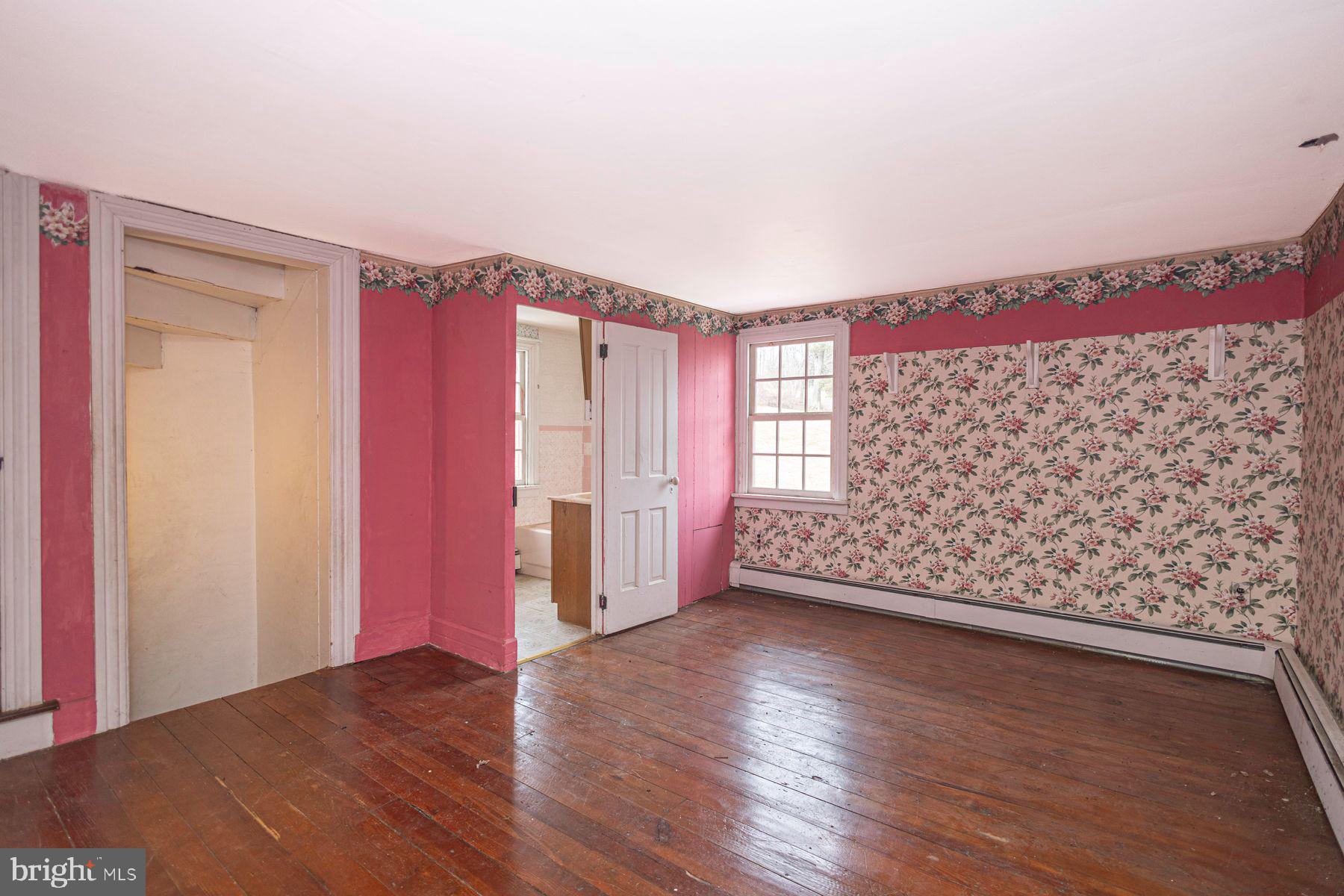 Lot 1 Curly Hill Road Doylestown, PA 18902 - Photo 35 of 40 a view of a room with wooden floor and bench