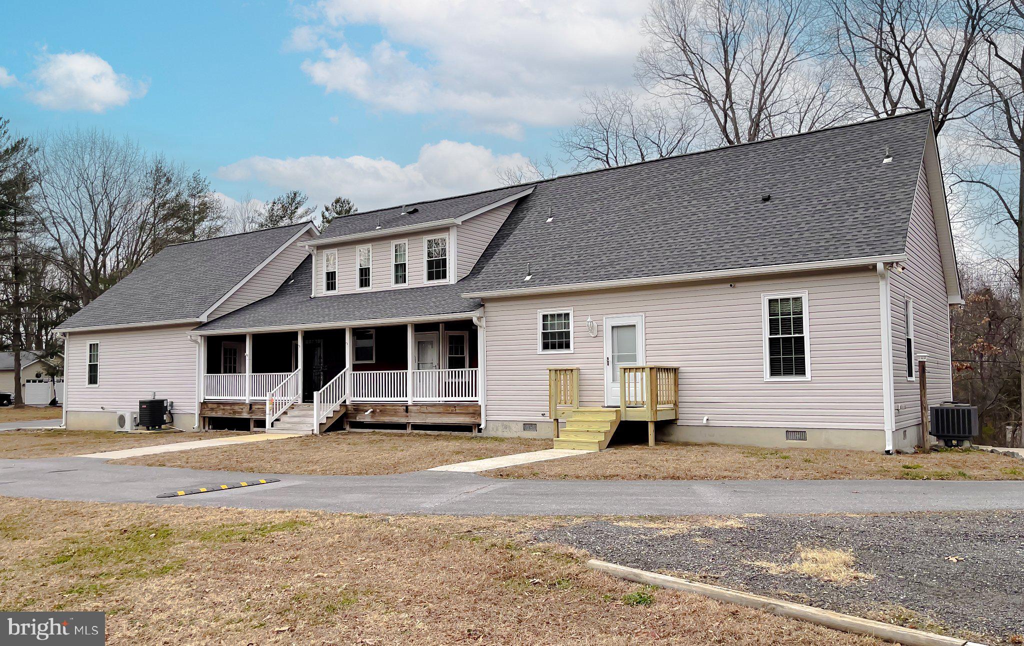 400 Adelina Road Prince Frederick, MD 20678 - Photo 55 of 57 Inviting screened in porch.