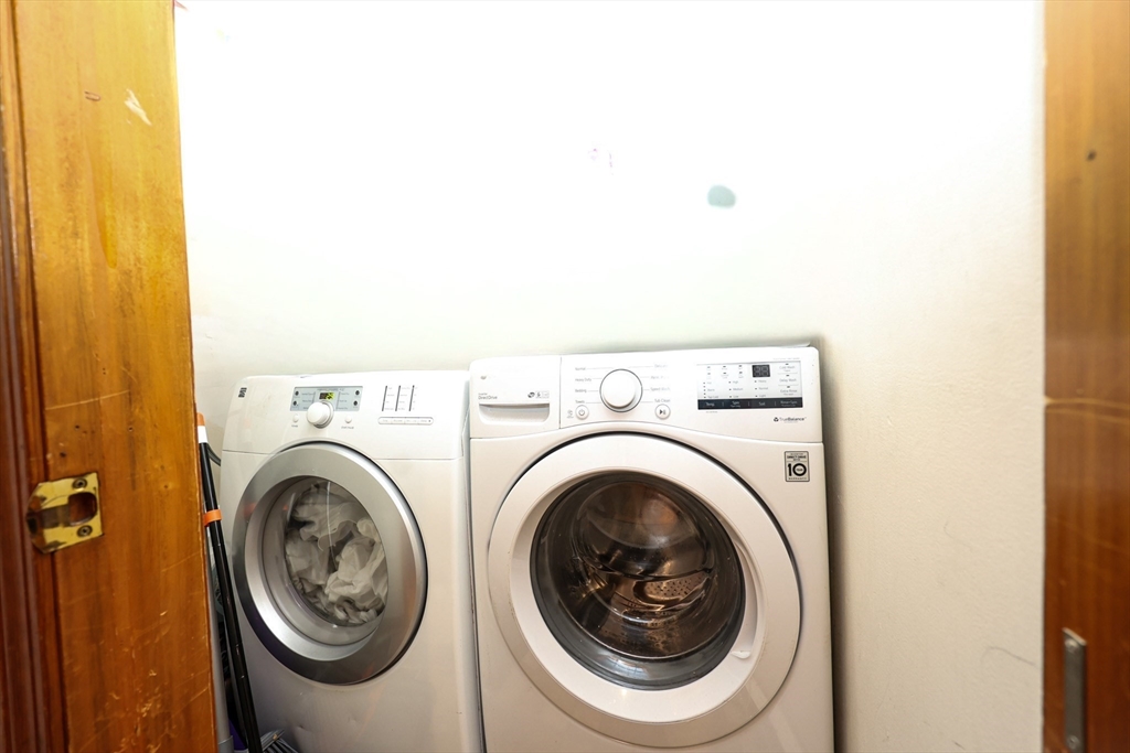 65 Clifford Street, Unit 2 Boston, MA 02136 - Photo 14 of 27 a utility room with dryer and washer