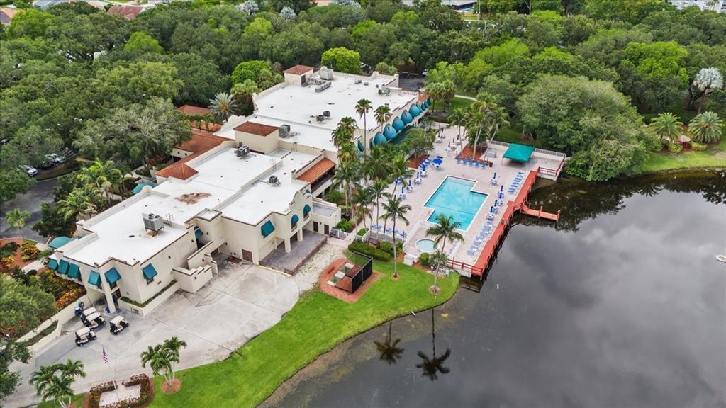 9470 Poinciana Place, Unit 1#103 Davie, FL 33324 - Photo 27 of 32 an aerial view of a house with a yard