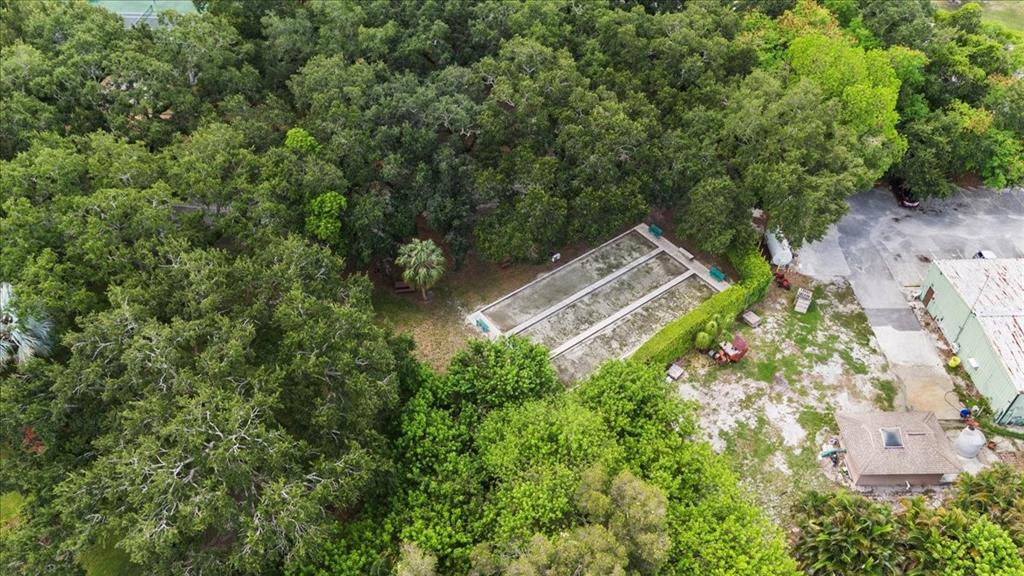 9470 Poinciana Place, Unit 1#103 Davie, FL 33324 - Photo 30 of 32 an aerial view of a house with a yard