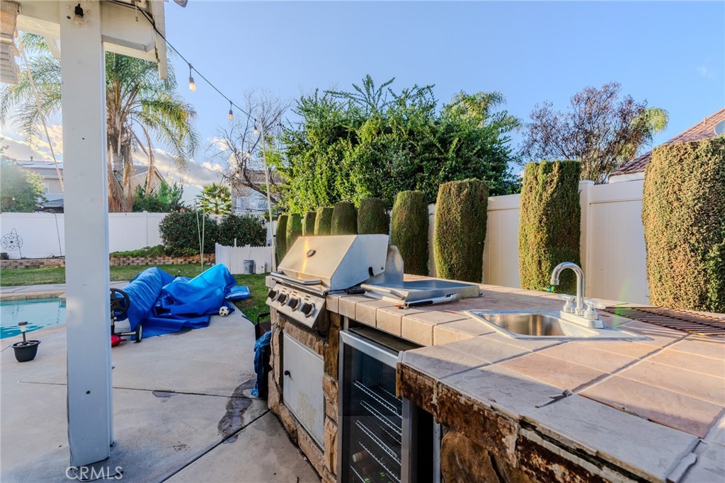 511 Madrid Street Hemet, CA 92545 - Photo 42 of 48 BBQ Island w/ sink, side-burner, and beverage fridge