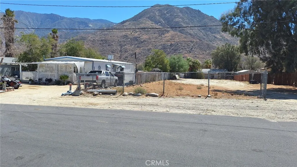 0 Irene Cabazon, CA 92230 - Photo 3 of 12 a view of a street with a house