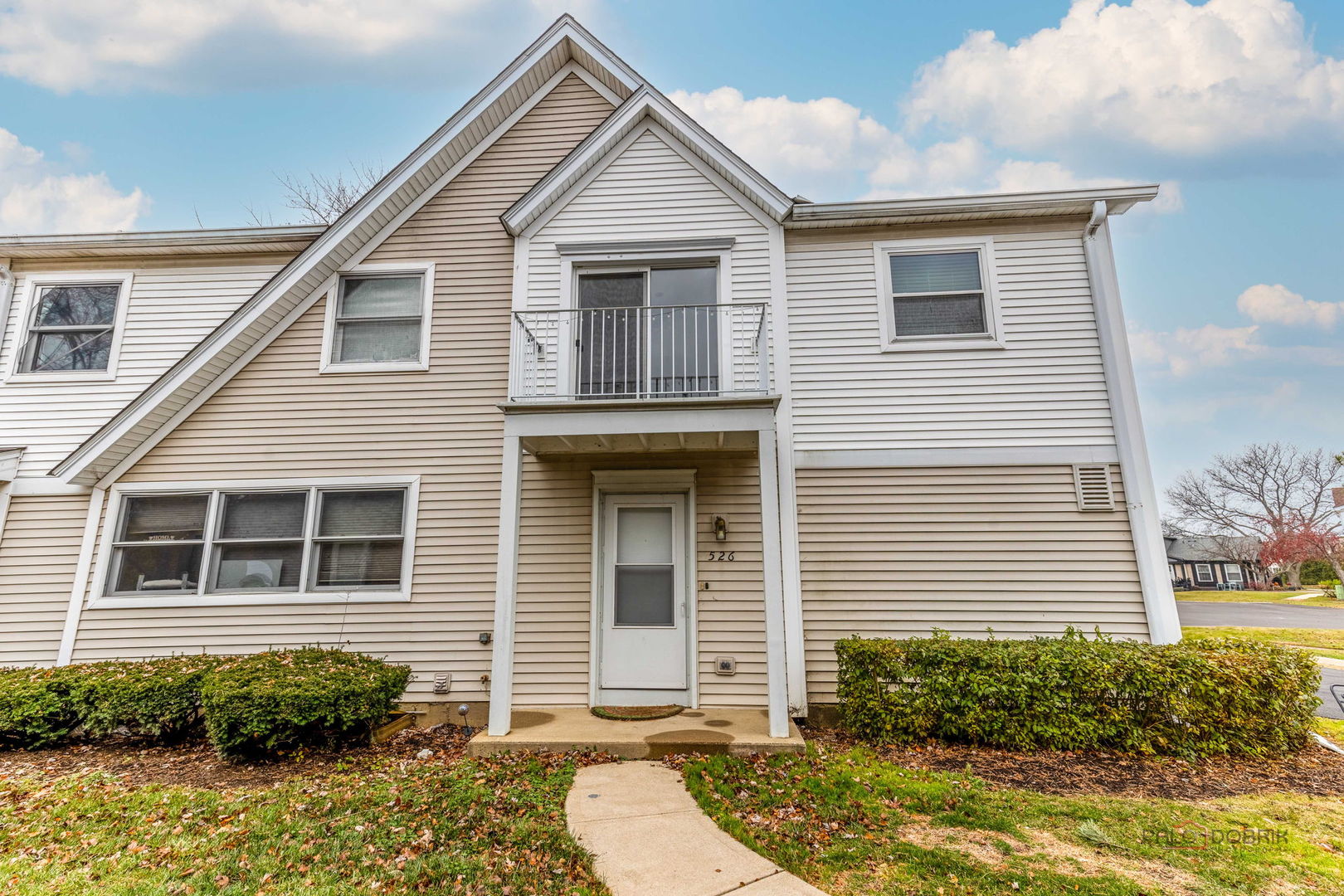 526 Inverrary Lane Deerfield, IL 60015 - Photo 2 of 8 a view of a house with small yard plants and large tree