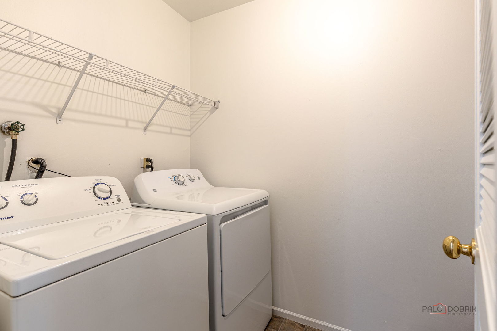 526 Inverrary Lane Deerfield, IL 60015 - Photo 6 of 8 a utility room with dryer and washer