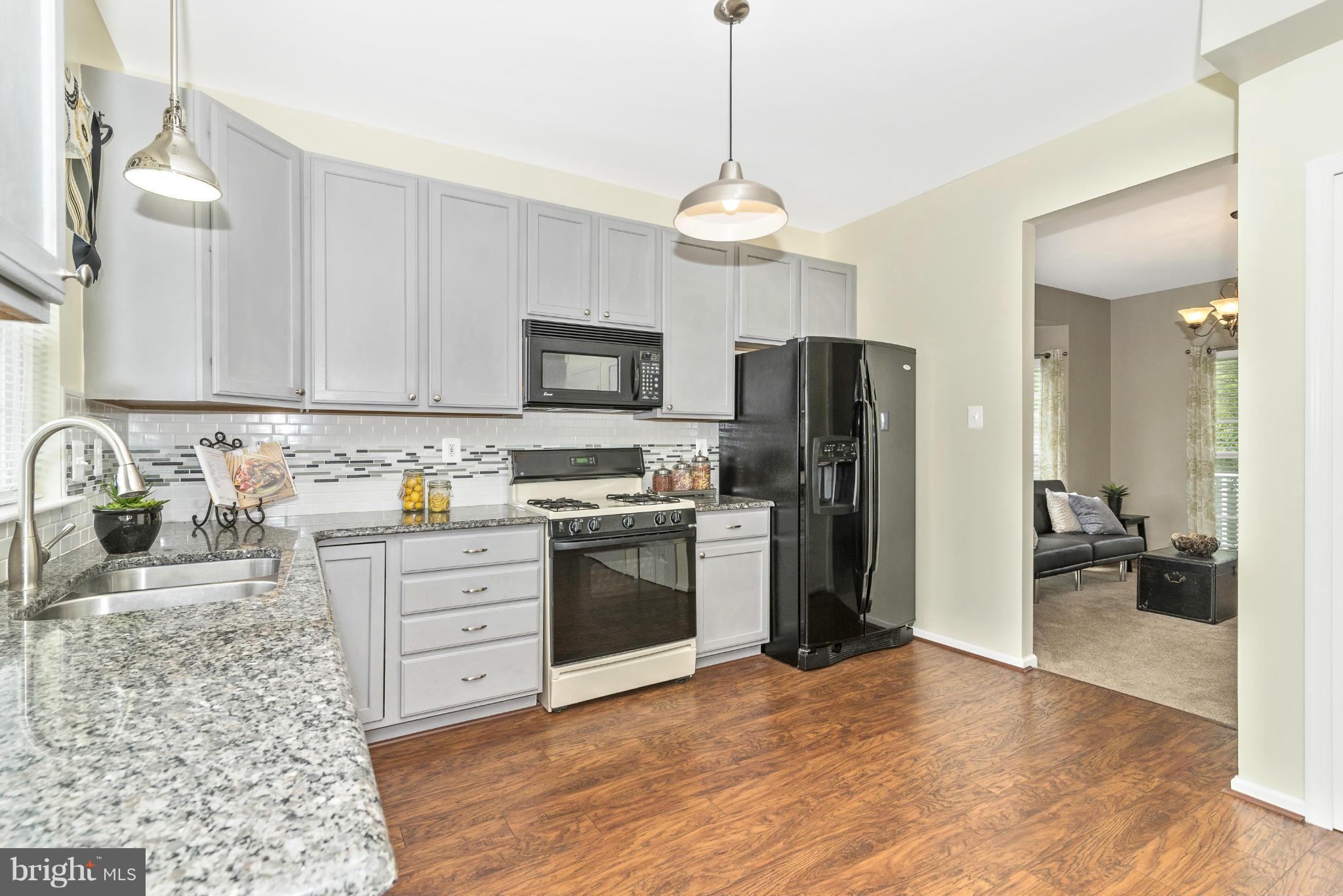 1208 Crossbow Road Mount Airy, MD 21771 - Photo 7 of 30 Kitchen with Granite Counters