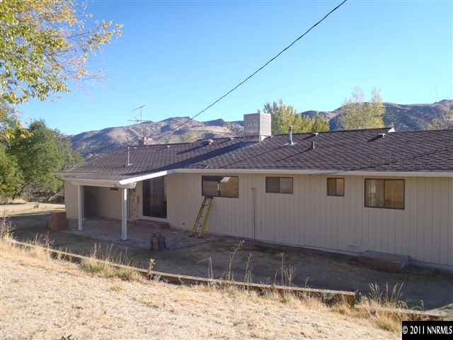 1305 Hot Springs Road Reno, NV 89521 - Photo 13 of 13 a view of a house with a yard