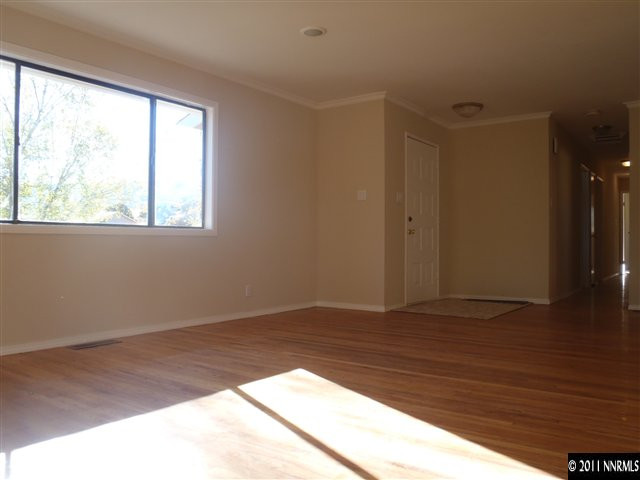 1305 Hot Springs Road Reno, NV 89521 - Photo 2 of 13 a view of an empty room and window