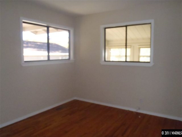 1305 Hot Springs Road Reno, NV 89521 - Photo 6 of 13 an empty room with a window