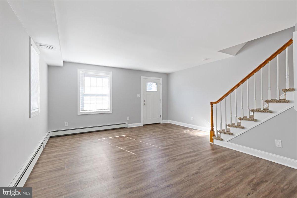 2921 Cowpath Road Hatfield, PA 19440 - Photo 12 of 30 wooden floor in an empty room with a window