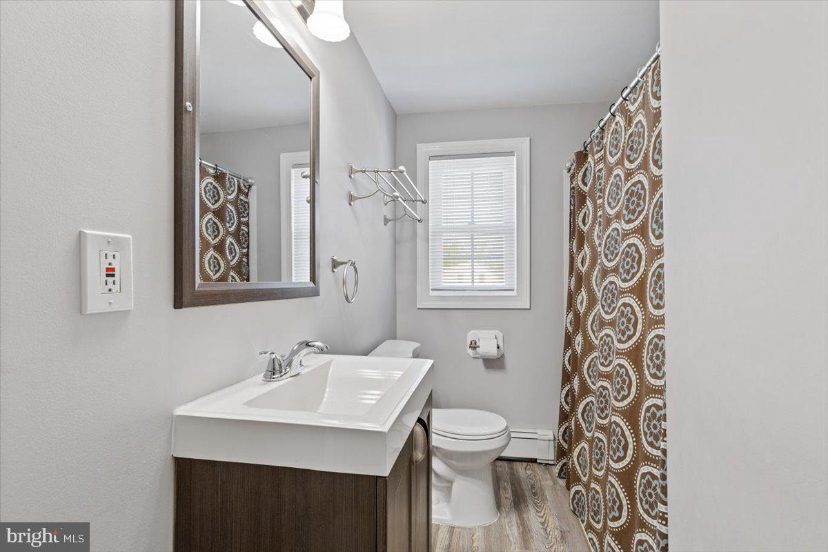 2921 Cowpath Road Hatfield, PA 19440 - Photo 17 of 30 a bathroom with a sink toilet and a mirror