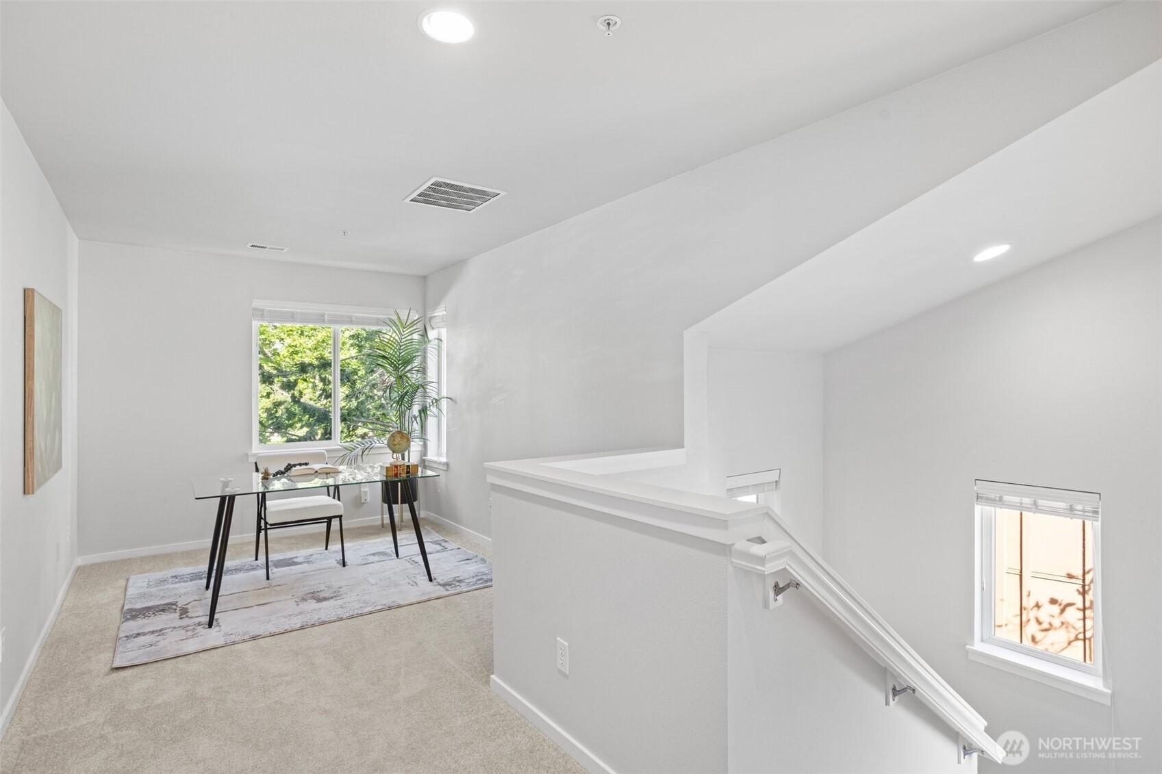 83 Sky Ridge Road Northwest Issaquah, WA 98027 - Photo 18 of 28 a workspace with furniture and a window