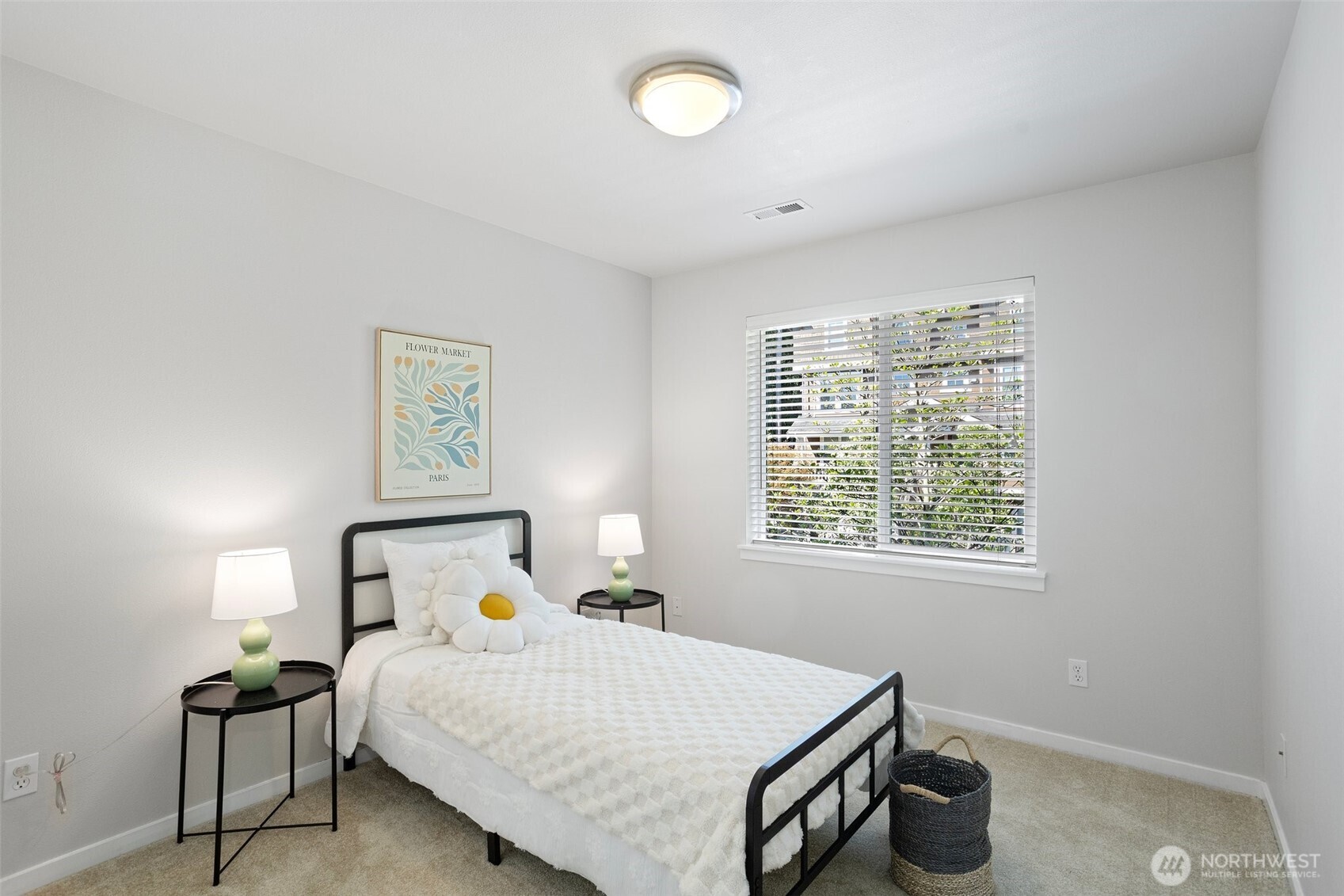 83 Sky Ridge Road Northwest Issaquah, WA 98027 - Photo 20 of 28 a bedroom with a bed and a window