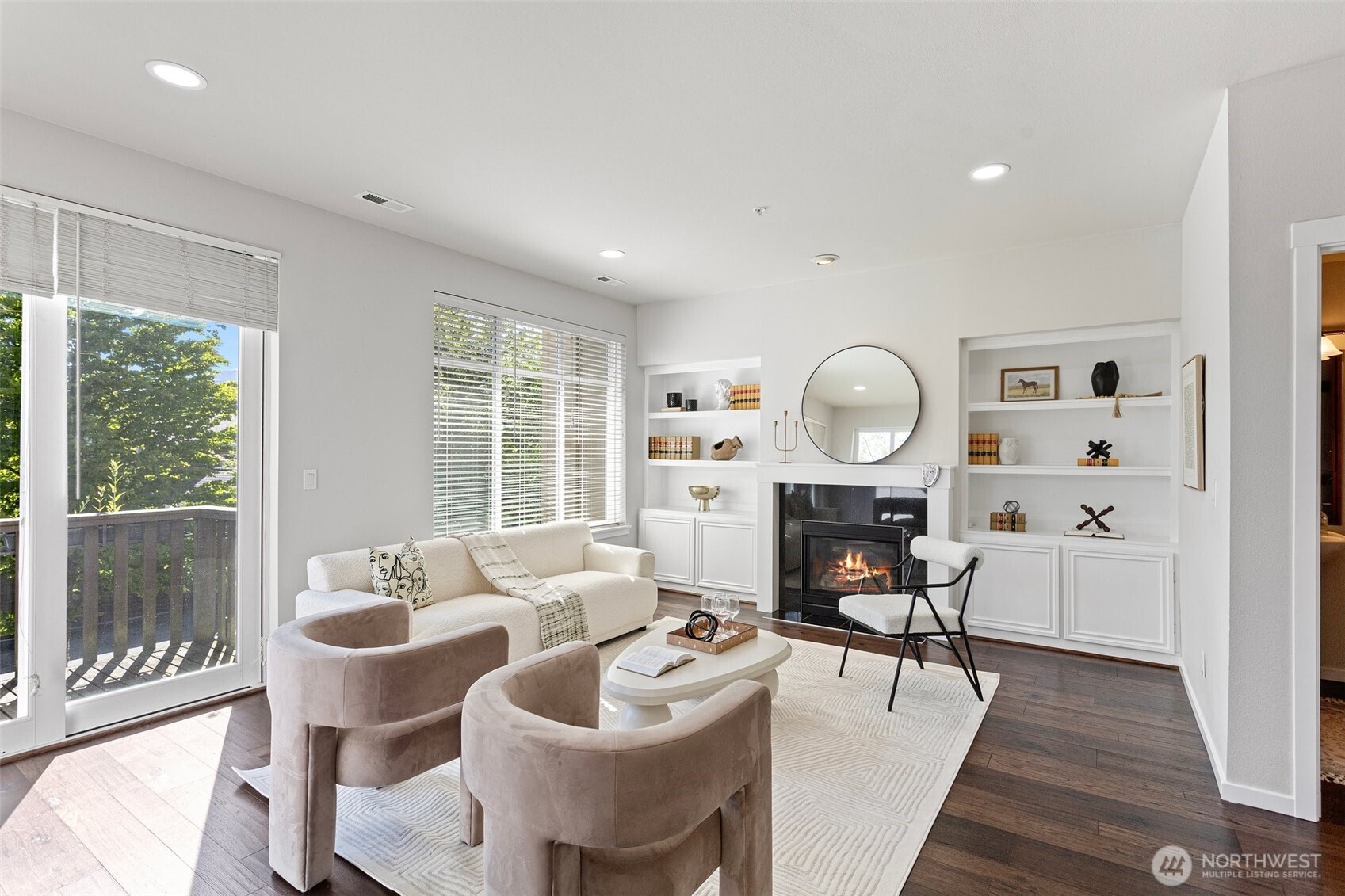 83 Sky Ridge Road Northwest Issaquah, WA 98027 - Photo 5 of 28 a living room with furniture a rug potted plant and a large window