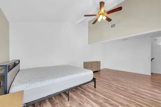 a bathroom with a sink vanity and a mirror