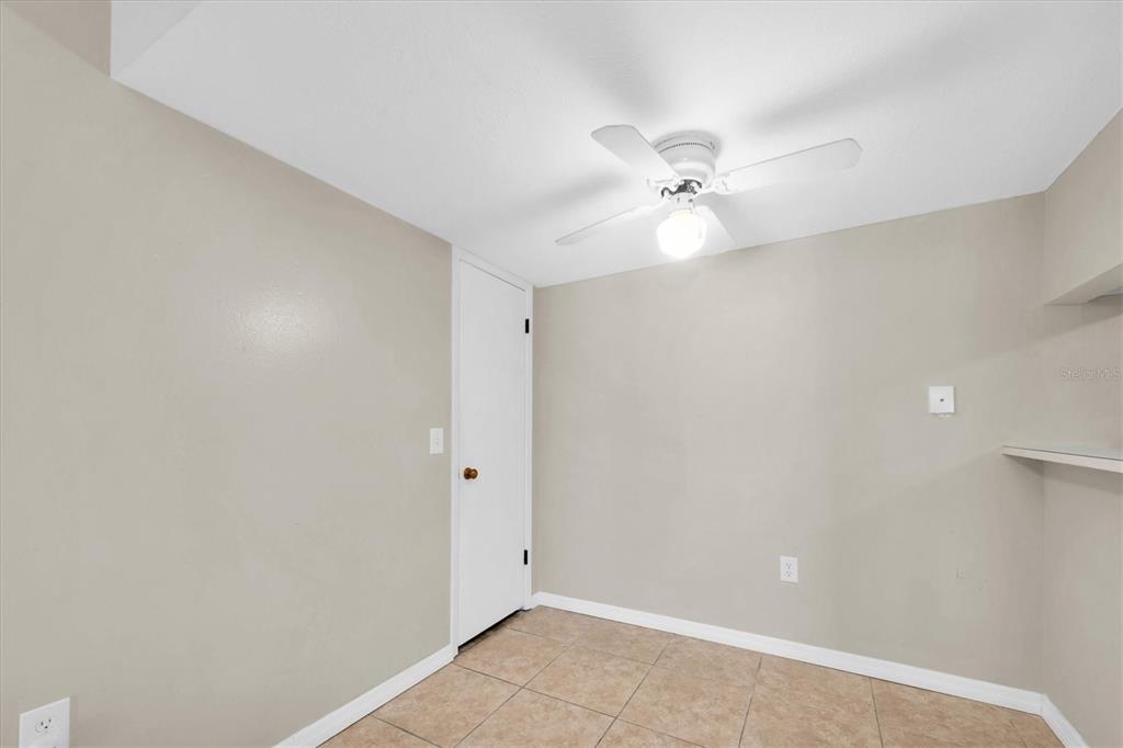 171 Medallion Boulevard, Unit F Madeira Beach, FL 33708 - Photo 17 of 30 a view of an empty room