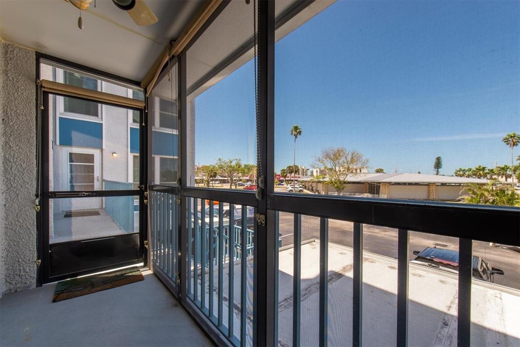 171 Medallion Boulevard, Unit F Madeira Beach, FL 33708 - Photo 20 of 30 a view of city from balcony
