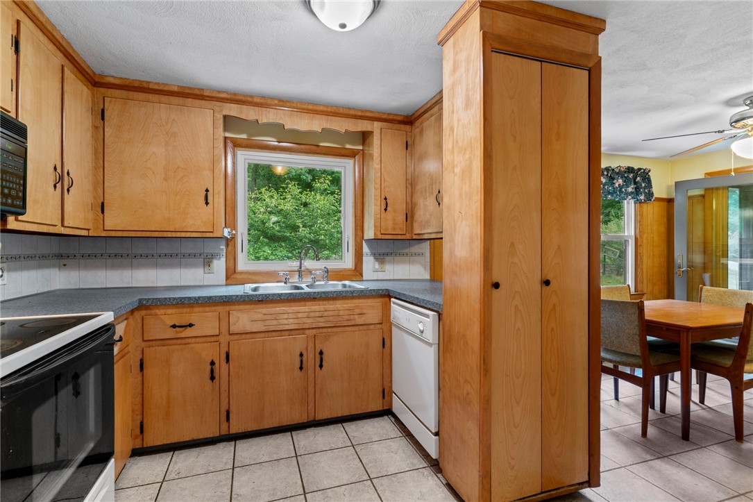 252 Log Bridge Road Coventry, RI 02816 - Photo 12 of 36 Roomy kitchen with a tall end pantry built in