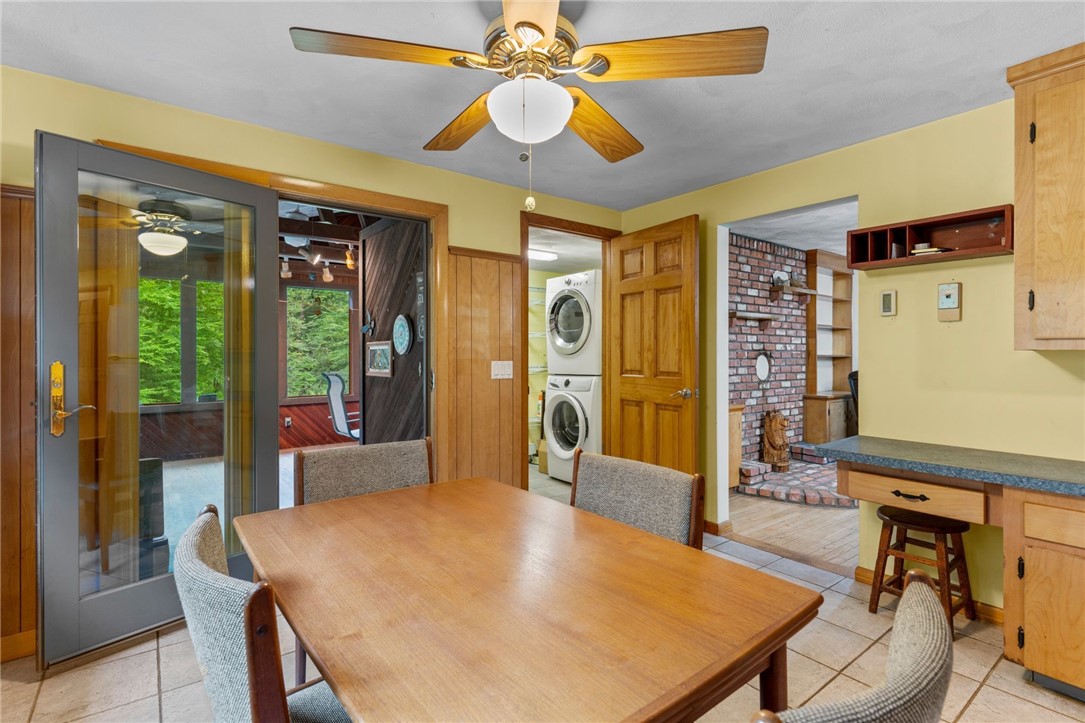 252 Log Bridge Road Coventry, RI 02816 - Photo 15 of 36 View from kitchen towards the enclosed porch entry and the walk-in large pantry with laundry on main llevel