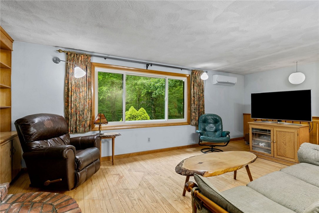 252 Log Bridge Road Coventry, RI 02816 - Photo 17 of 36 Big living room with hardwood floors