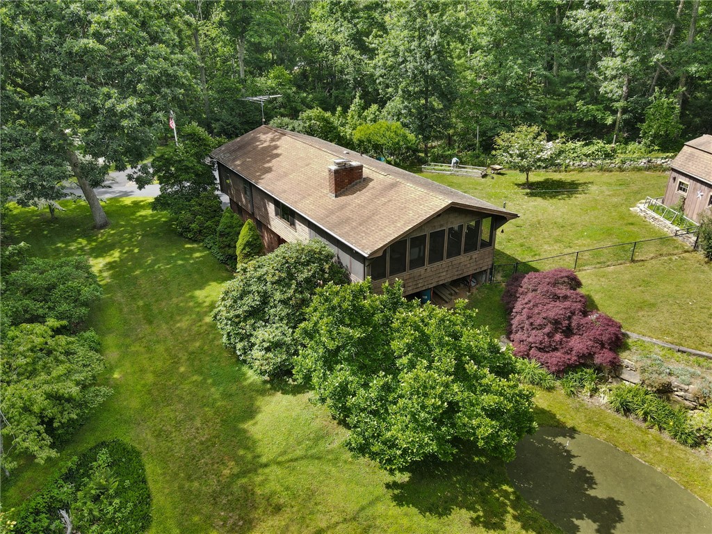 252 Log Bridge Road Coventry, RI 02816 - Photo 3 of 36 Giant enclosed porch offers lots of possibilities - and entertainment! Plus your very own putting green!