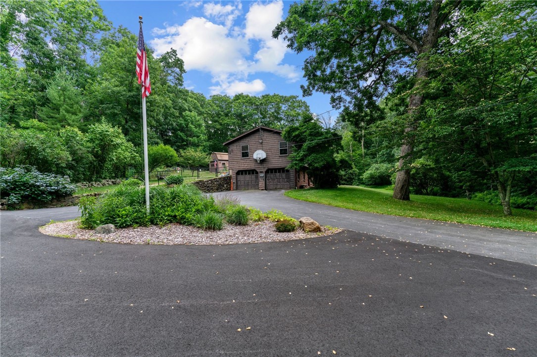 252 Log Bridge Road Coventry, RI 02816 - Photo 35 of 36 Come down the private driveway to this awesome flag garden and circular drive