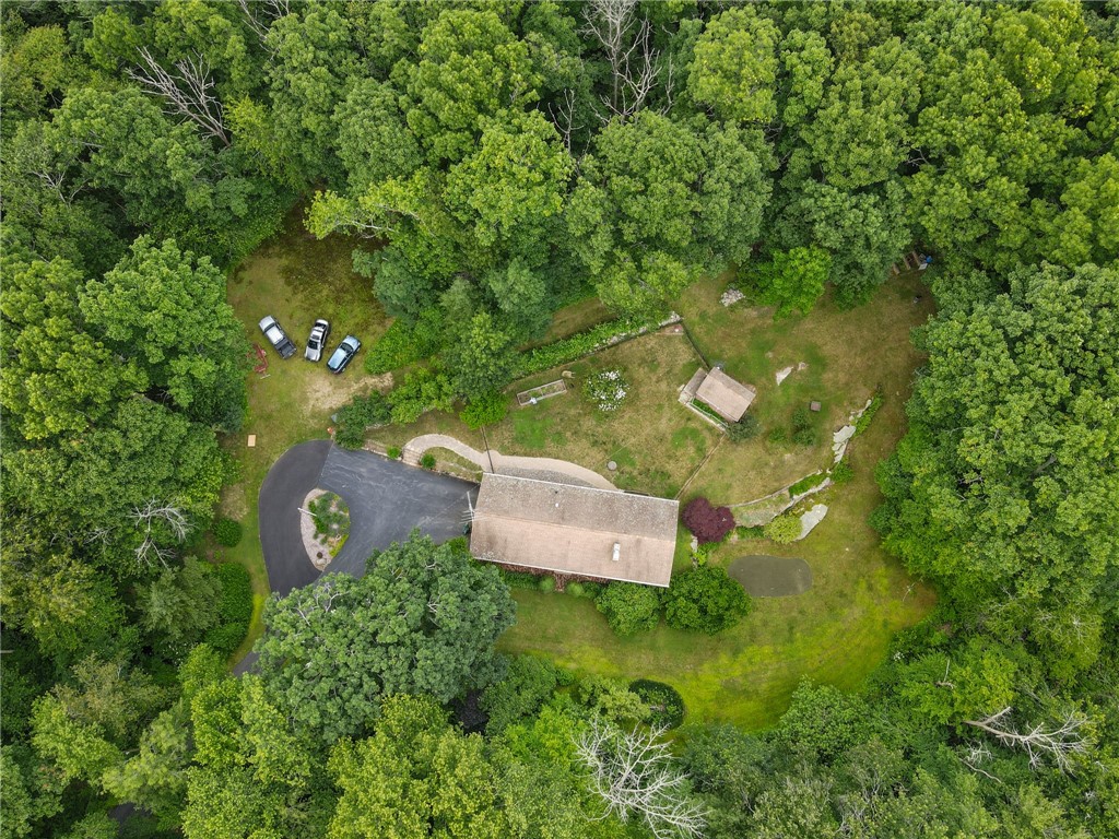 252 Log Bridge Road Coventry, RI 02816 - Photo 4 of 36 Lots of pretty landscaped areas, a fenced yard, circular drive at the end of a private driveway and surrounded by woods. Country life at its best!
