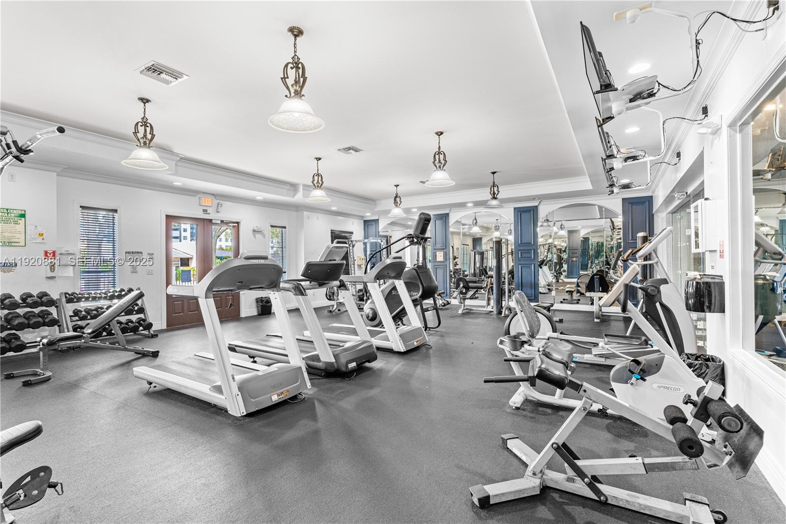 6821 Southwest 44th Street, Unit 203 Miami, FL 33155 - Photo 25 of 28 a view of a room with gym equipment