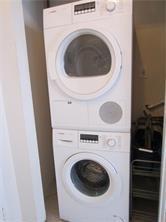 1421 South Ocean Boulevard, Unit 318 Pompano Beach, FL 33062 - Photo 13 of 36 a utility room with dryer and washer