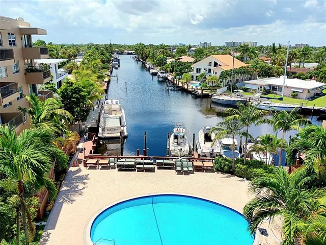 an aerial view of a house with outdoor space