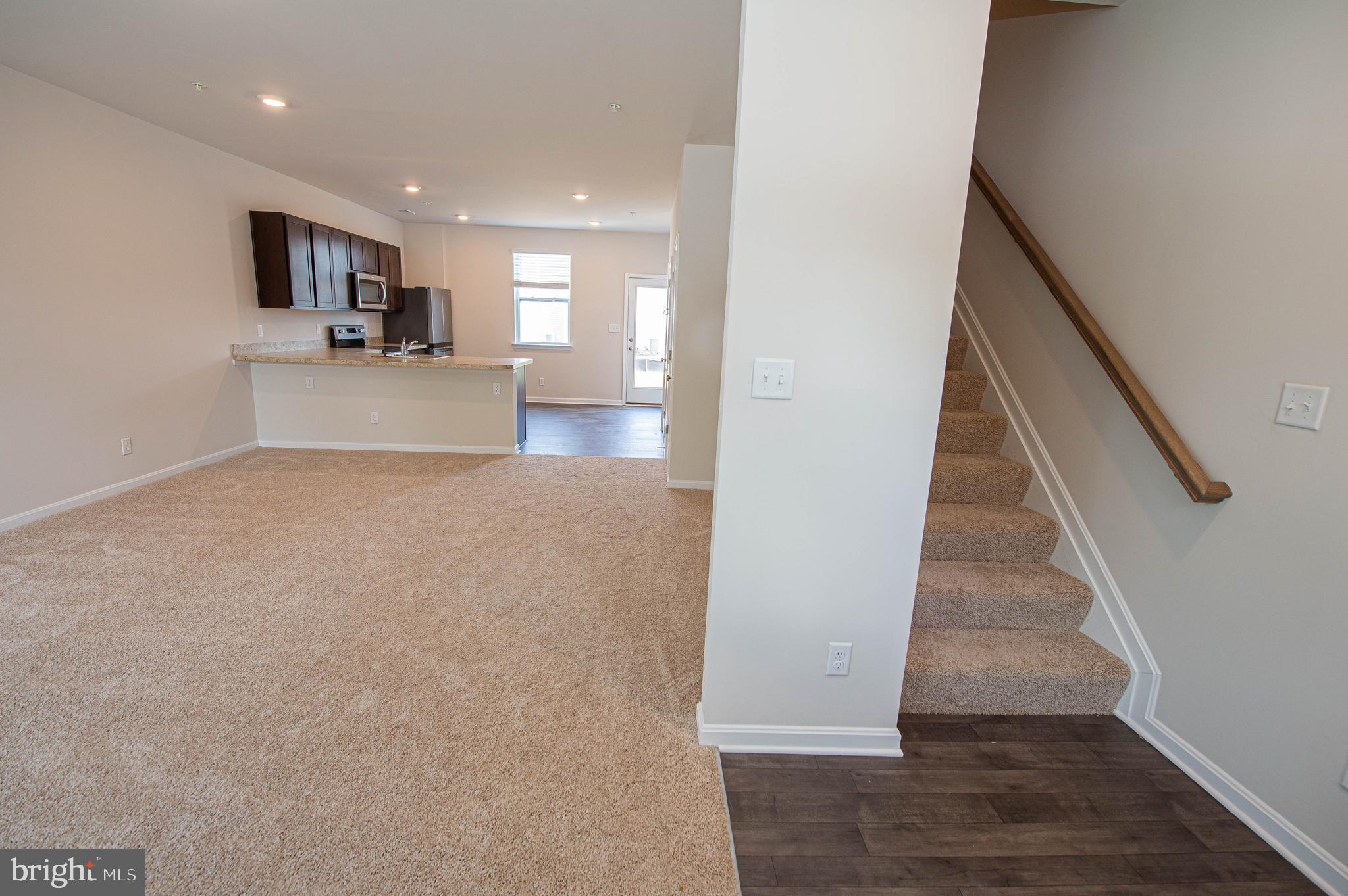 126 Willowtree Lane Fruitland, MD 21826 - Photo 15 of 68 a view of a kitchen with wooden floor and a kitchen