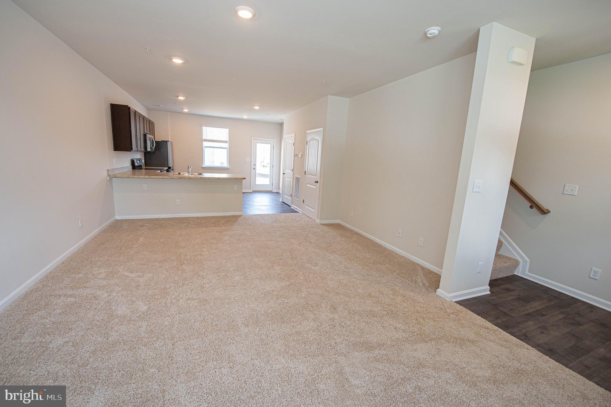 126 Willowtree Lane Fruitland, MD 21826 - Photo 17 of 68 a view of a kitchen with a sink and a window