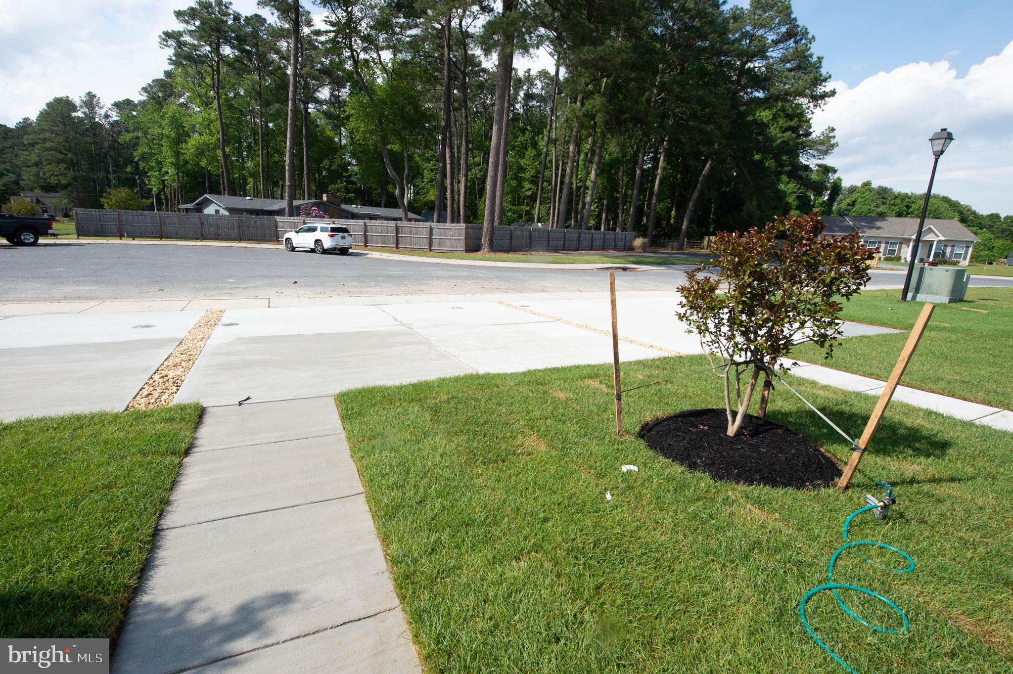 126 Willowtree Lane Fruitland, MD 21826 - Photo 5 of 68 a view of a garden with a slide